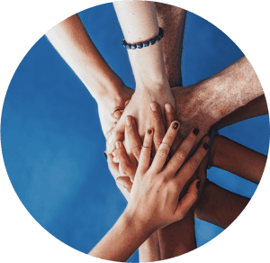 Hands of many people overlapping one another